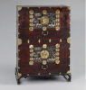 Two-Tier Chest This durable and practical wooden chest used for storing clothes is lavishly decorated with a mother-of-pearl inlay design.